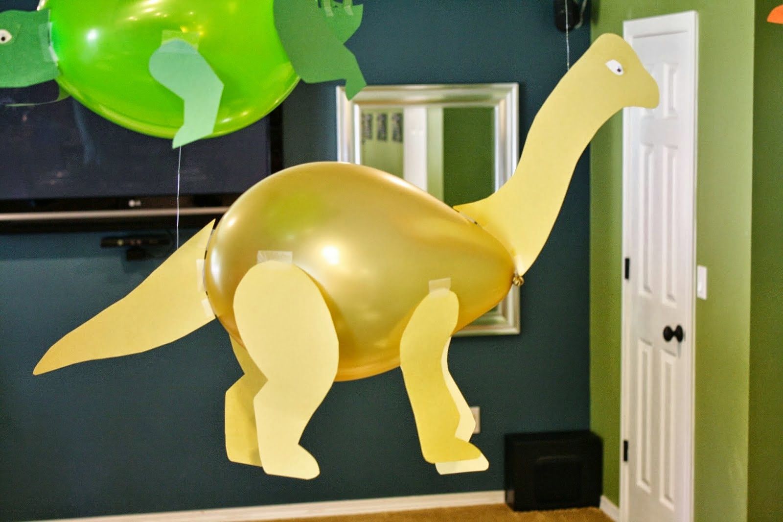 Dinosaurios con globos